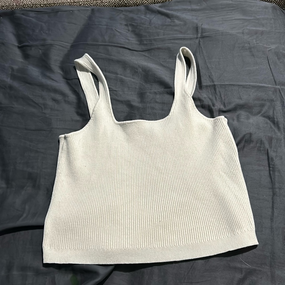 Women’s Guess What? White tank crop top.